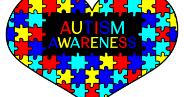 Hart van puzzelstukjes met tekst autisme